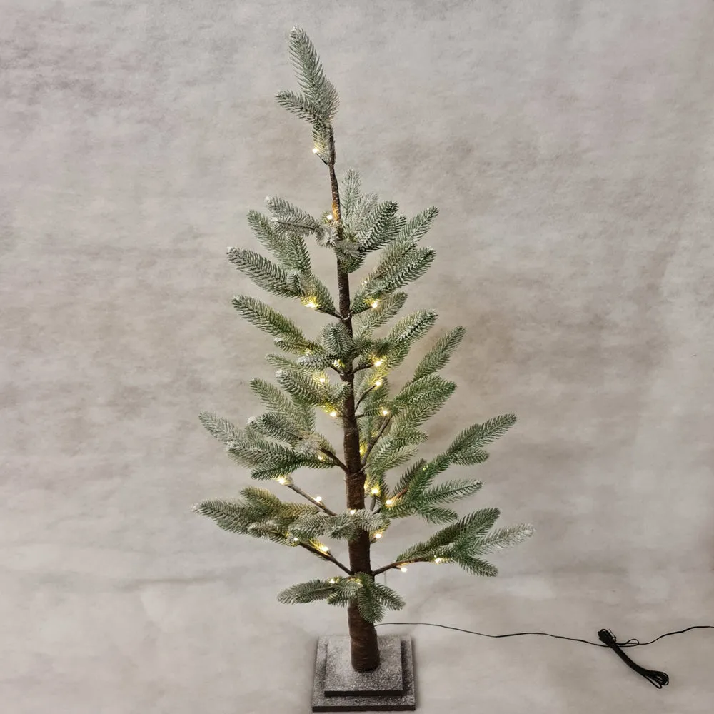 Snow flocked tree